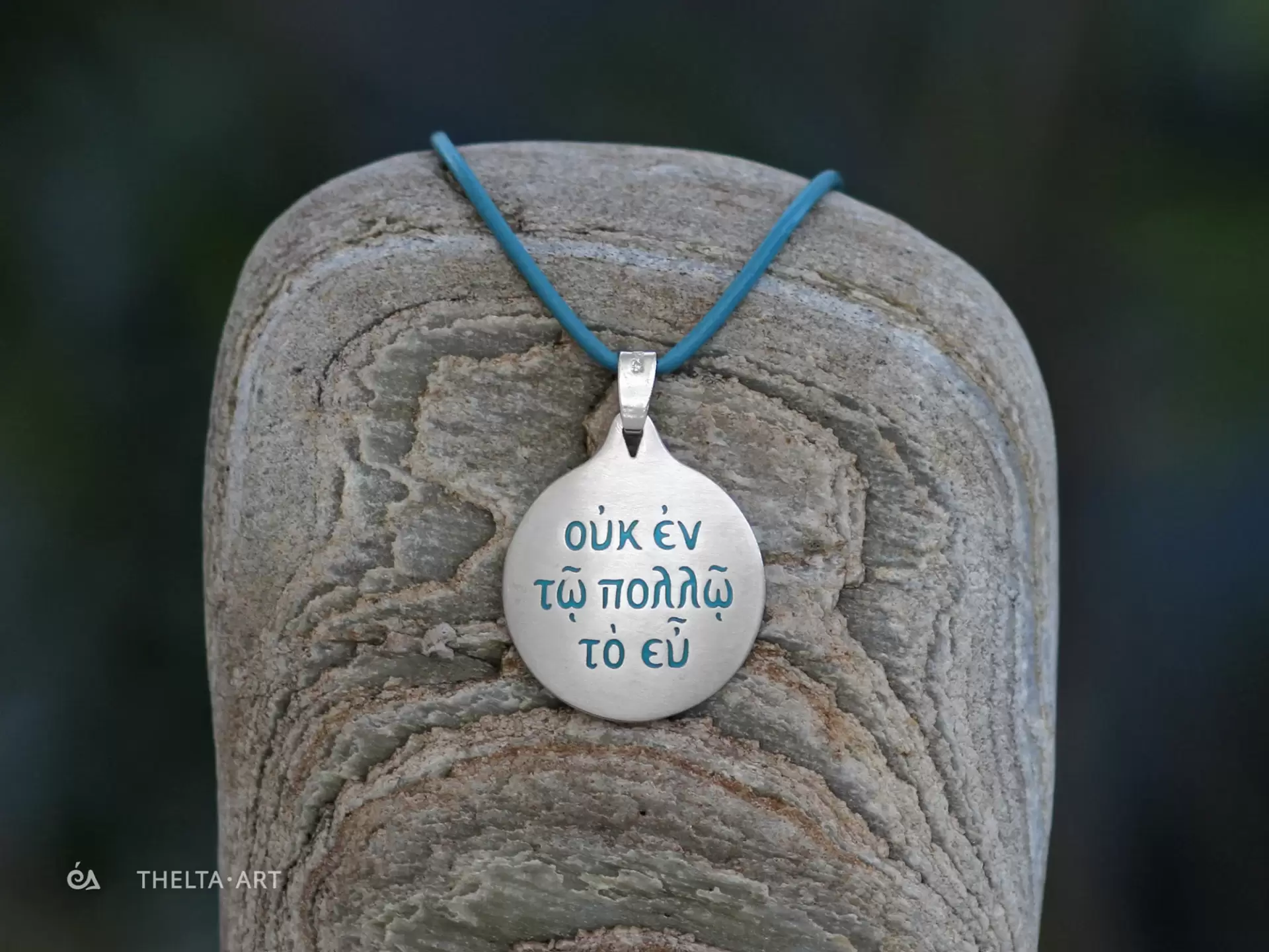 "Uk en to pollo to eu" Handcrafted sterling silver pendant with turquoise enameled letters & natural leather cord