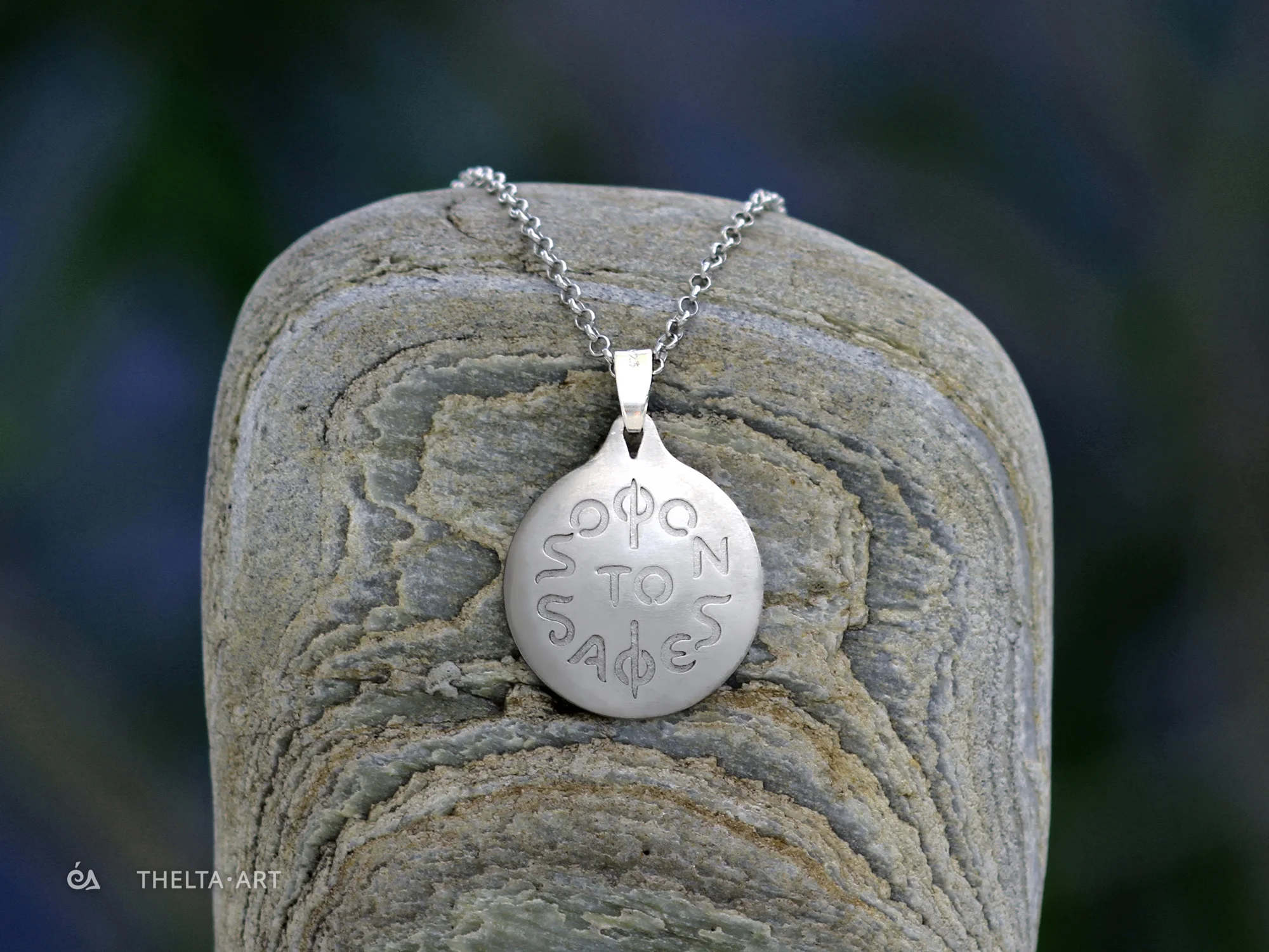 "Sofon to Safes" - a handmade, platinum-plated 925 silver pendant and chain with colorless script.