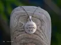 Silver pendant & chain – Oxidized script A silver "Uk en to pollo to eu" pendant and chain, with oxidized engraved script